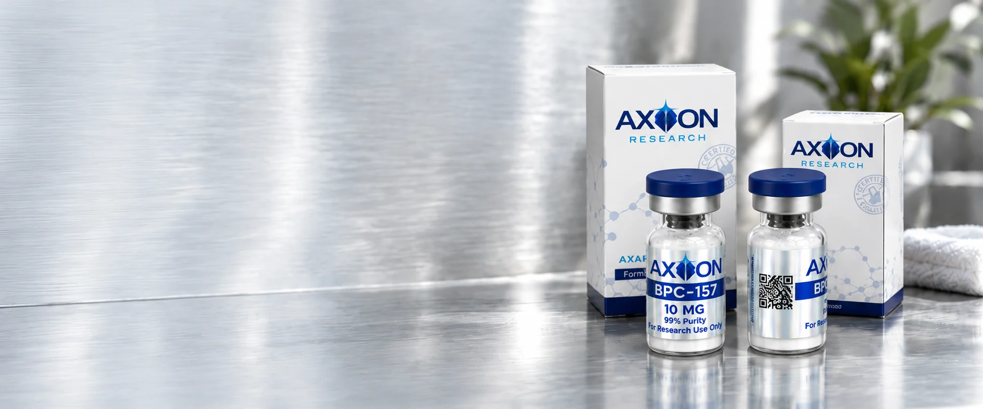 Axion Research blue-cap vials and white product boxes on a platinum counter
